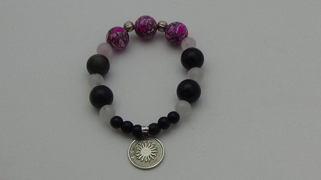 PULSERA DE CUARZO OBSIDIANA Y CUARZO ROSA CON DIJE DEL ENEGRAMA SOLAR DE PLATA