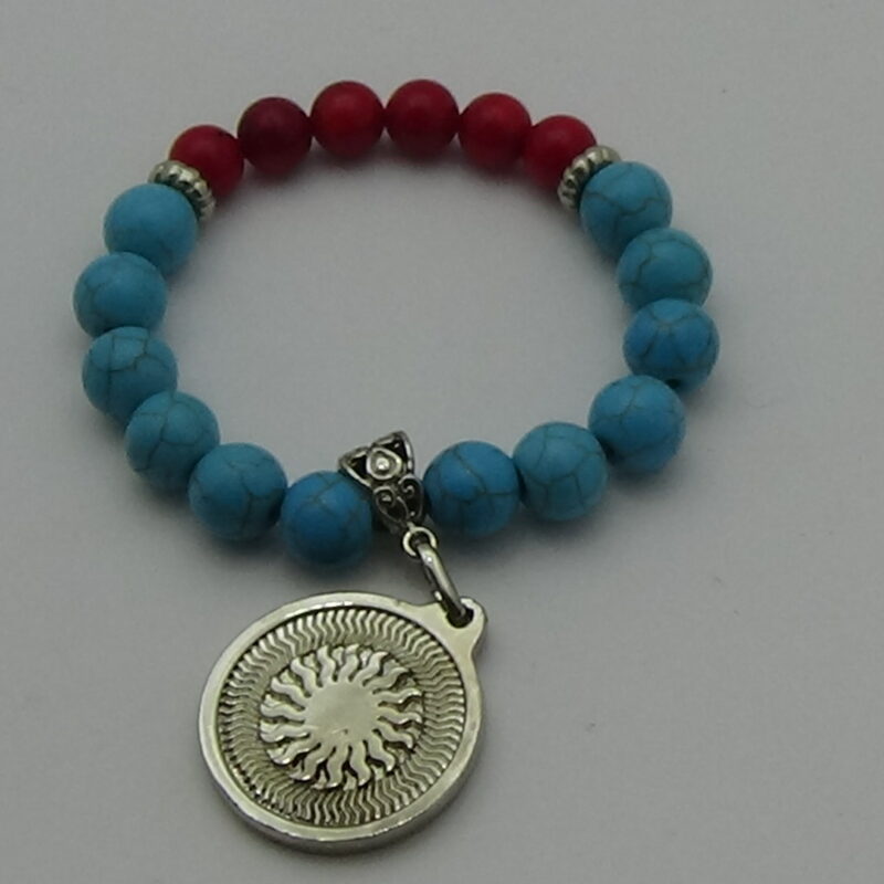 PULSERA DE CUARZO TURQUESA Y PIDRA CORAL CON DIJE DEL ENEGRAMA SOLAR DE PLATA