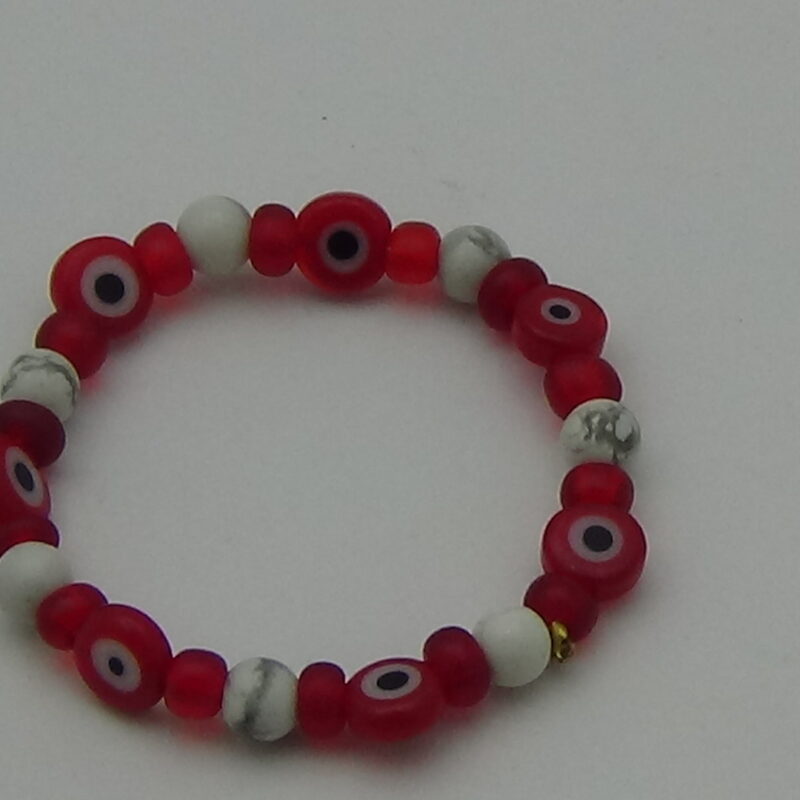 PULSERA PARA BEBÉ ROJA CON OJOS PROTECTORES