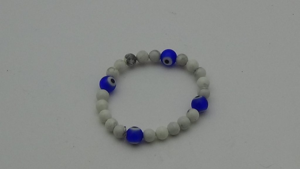 PULSERA PARA BEBÉ CUARZO HOWLITA CON OJOS PROTECTORES