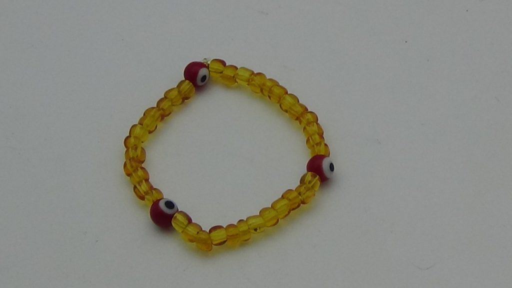 PULSERA PARA BEBÉ DE CUARZO ÁMBAR CON OJOS PROTECTORES