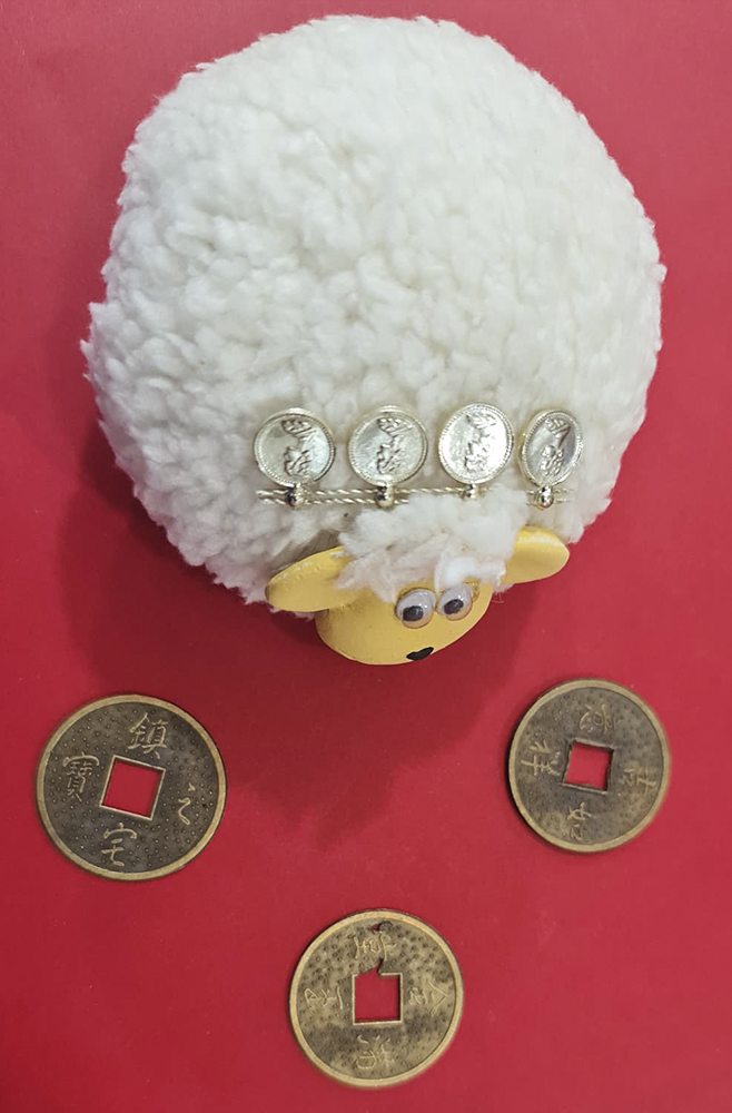 BORREGO DE LA ABUNDANCIA CON 3 MONEDAS CHINAS CHICO