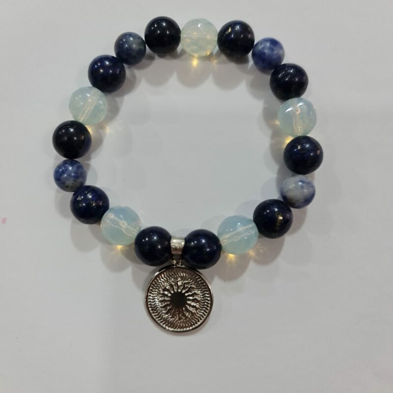 PULSERA DE CUARZO PIEDRA LUNA, CUARZO SODALITA Y CUARZO OBSIDIANA CON DIJE DEL ENEGRAMA SOLAR DE PLATA