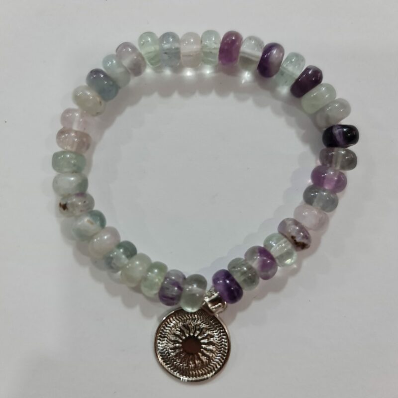 PULSERA DE CUARZO FLUORITA CON DIJE DEL ENEGRAMA SOLAR DE PLATA