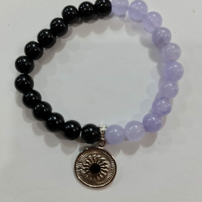 PULSERA DE CUARZO CANDY MORADO Y CUARZO OBSIDIANA CON DIJE DEL ENEGRAMA SOLAR DE PLATA