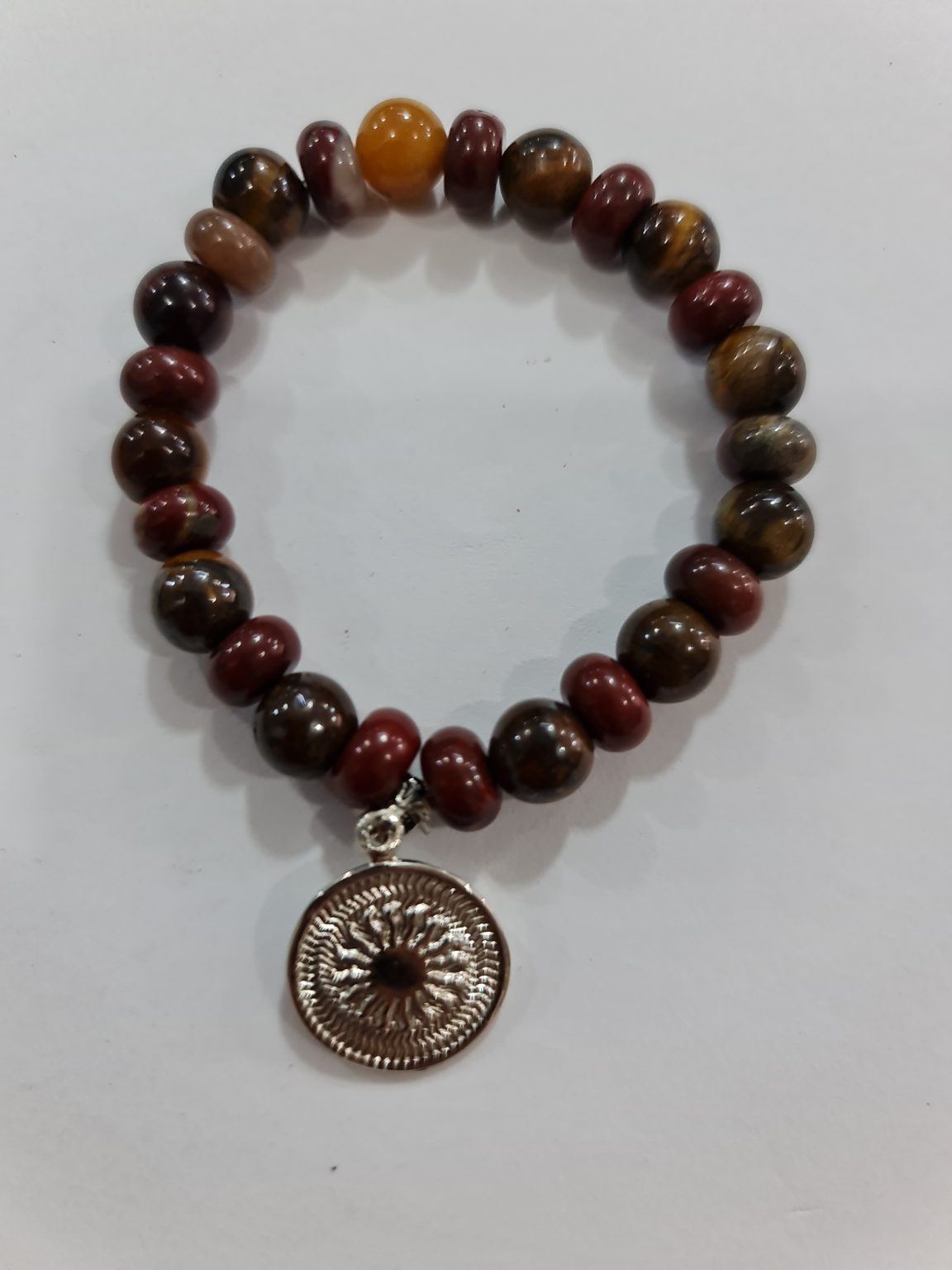 PULSERA DE CUARSO ÁGATA CORNALINA Y CUARZO OJO DE TIGRE CON DIJE DEL ENEGRAMA SOLAR DE PLATA