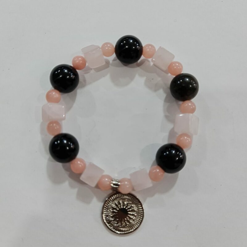 PULSERA DE CUARZO ROJO Y CUARZO OBSIDIANA CON DIJE DEL ENEGRAMA SOLAR DE PLATA