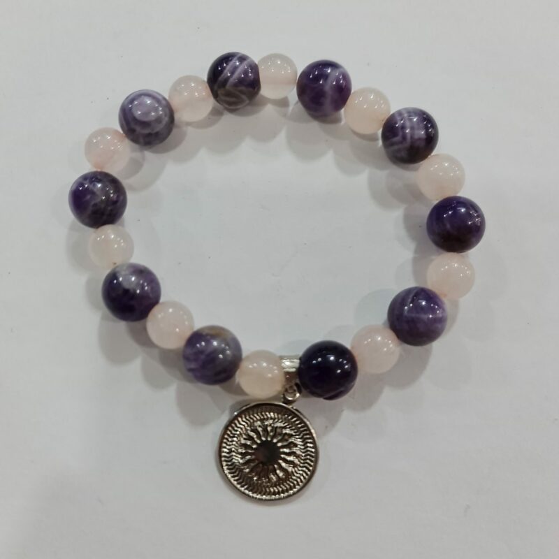 PULSERA DE CUARZO AMATISTA Y CUARZO ROSA CON DIJE DEL ENEGRAMA SOLAR DE PLATA