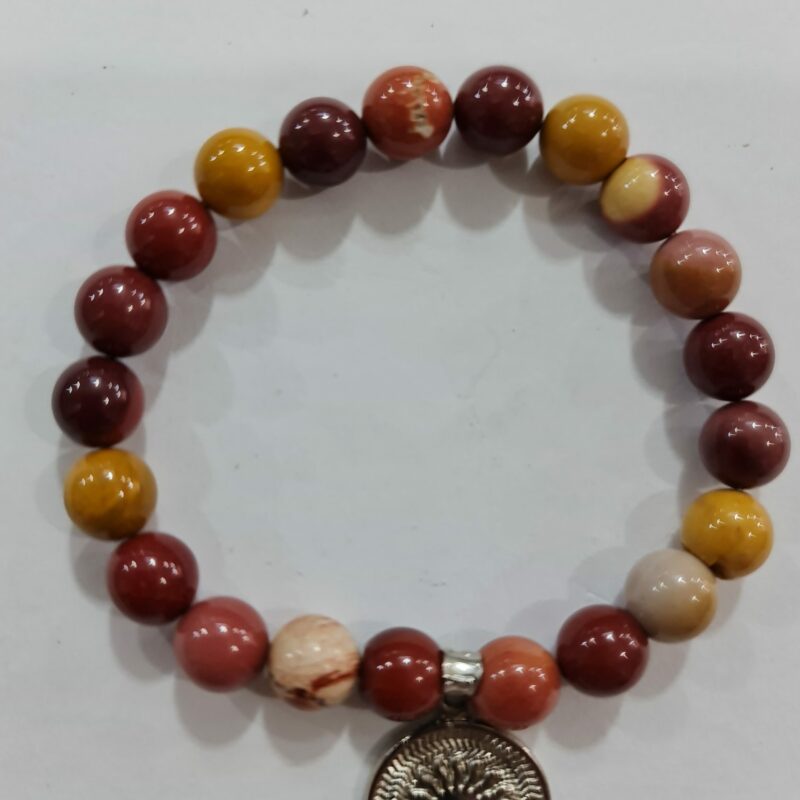 PULSERA DE CUARZO MAKAITA CON DIJE DEL ENEGRAMA SOLAR DE PLATA