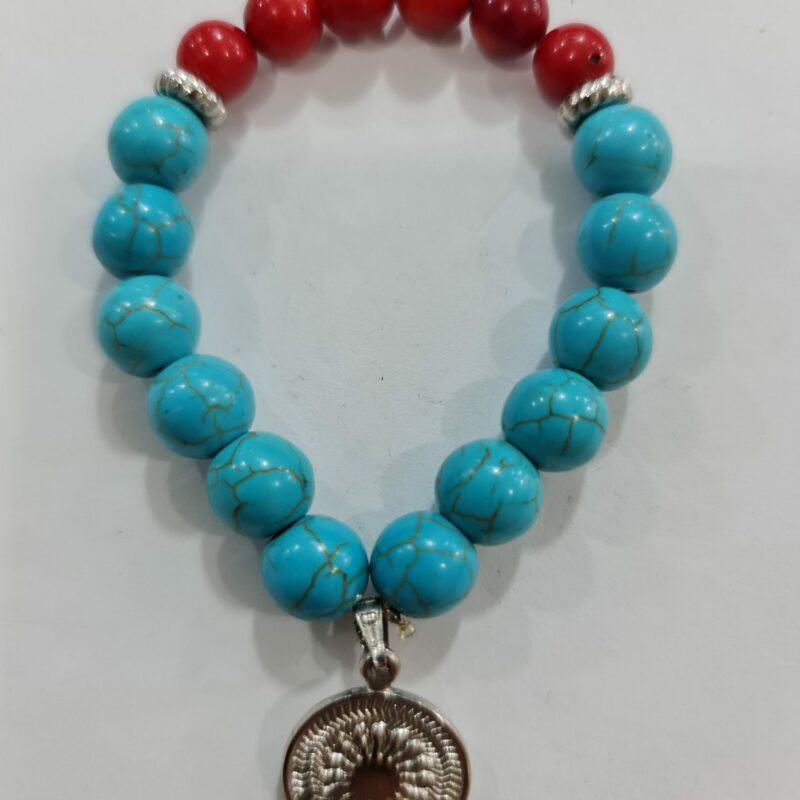 PULSERA DE CUARZO TURQUESA Y CUARZO O PIEDRA CORAL CON DIJE DEL ENEGRAMA SOLAR DE PLATA