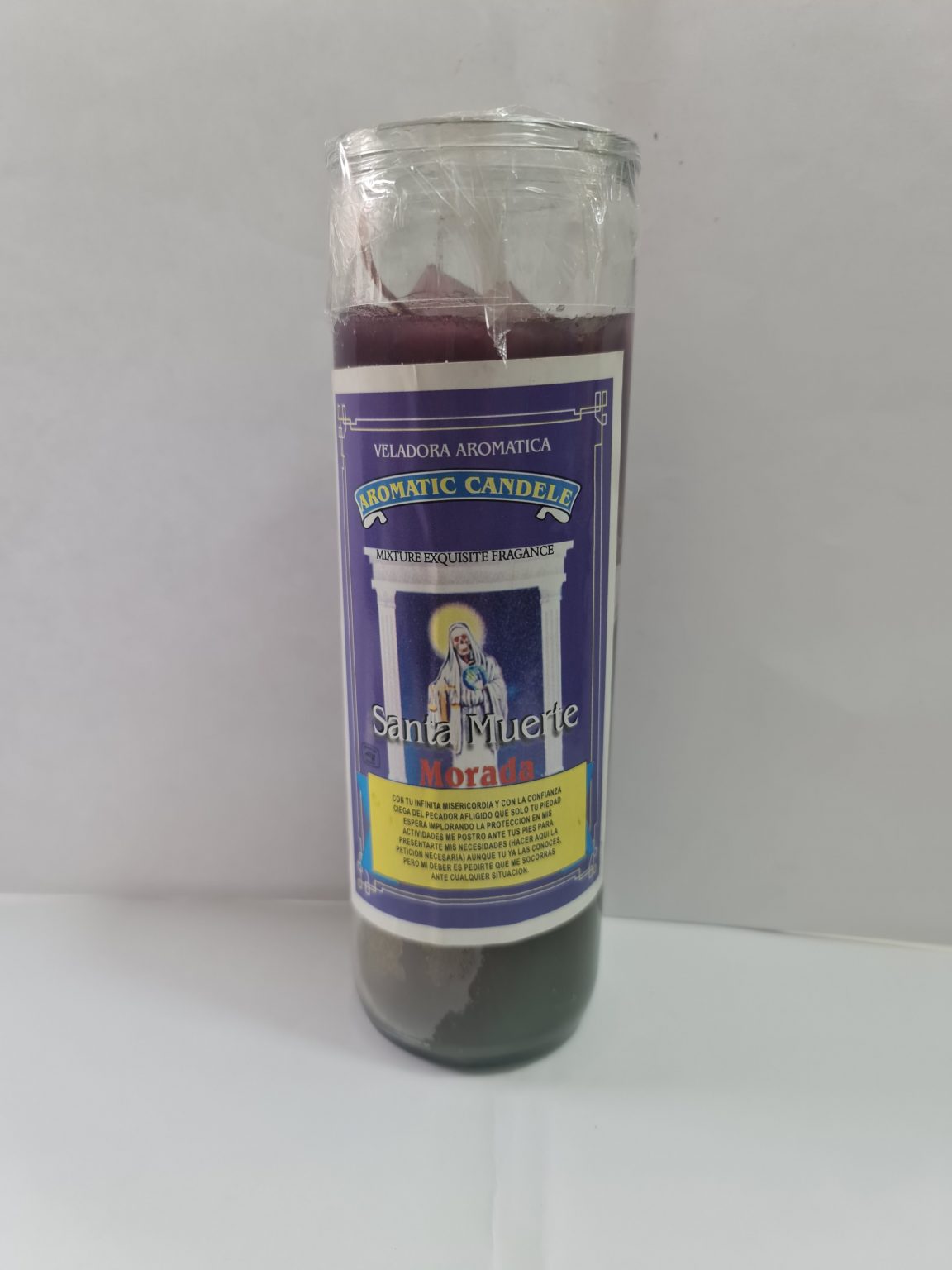 VELADORA DE VASO DE SANTA MUERTE MORADA PREPARADA