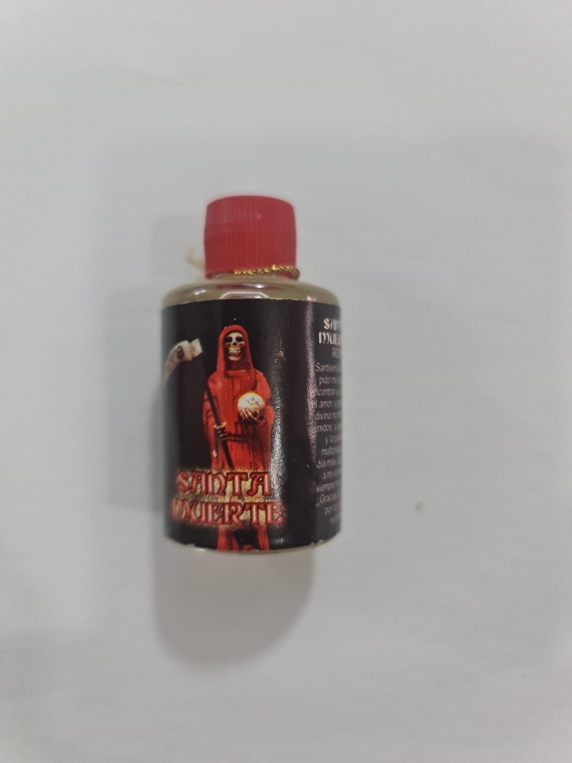 ESENCIA REDONDA DE SANTA MUERTE ROJA