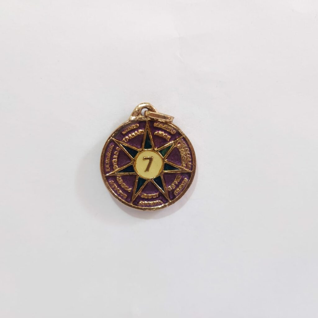 TALISMÁN ESTRELLA DE 7 PUNTAS MORADO