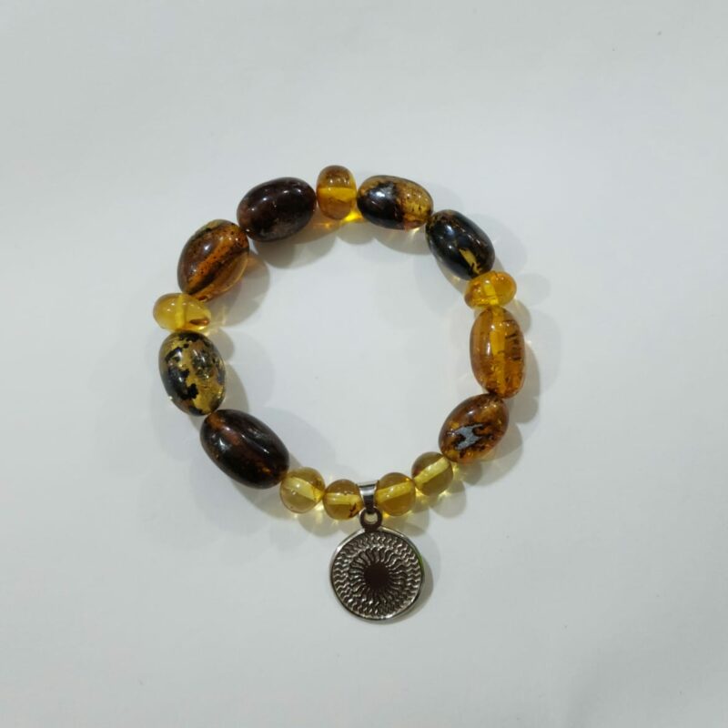 PULSERA DE CUARZO ÁMBAR CON DIJE DEL ENEGRAMA SOLAR DE PLATA