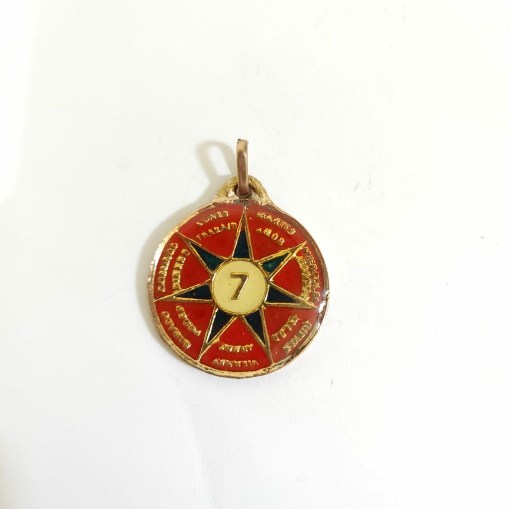 TALISMÁN DE ESTRELLA DE 7 PUNTAS ROJO